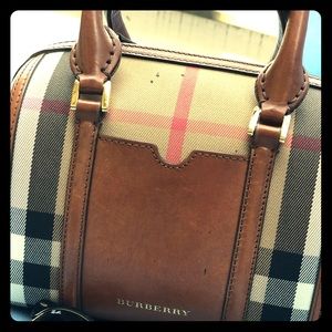 Selling authentic burberry purse